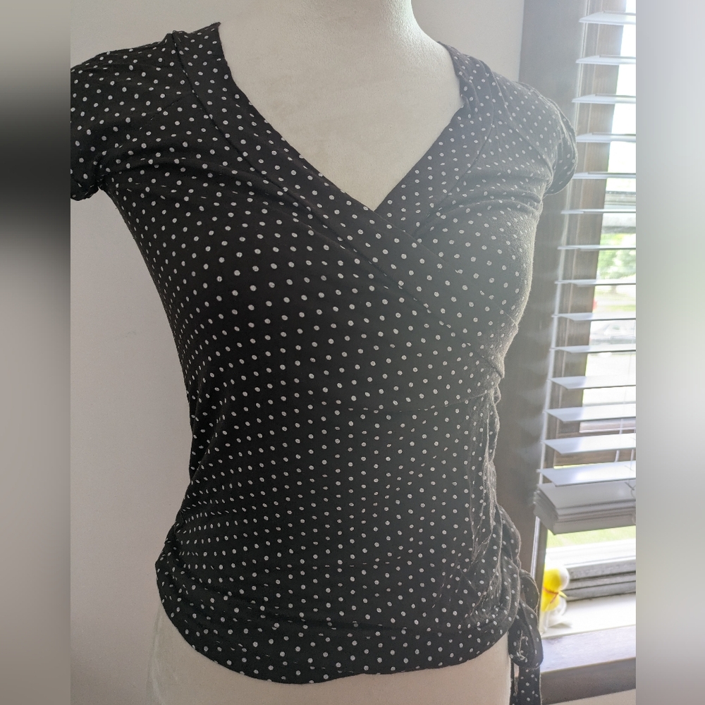 Brown wrapped top with white polka dots bow on the side size S